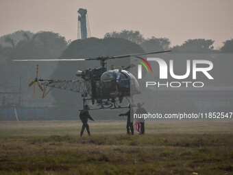 Indian Army helicopters take part in a practice run for the upcoming Vijay Diwas celebrations in Kolkata, India, on December 10, 2024. Vijay...