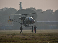 Indian Army helicopters take part in a practice run for the upcoming Vijay Diwas celebrations in Kolkata, India, on December 10, 2024. Vijay...