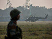 Indian Army helicopters take part in a practice run for the upcoming Vijay Diwas celebrations in Kolkata, India, on December 10, 2024. Vijay...