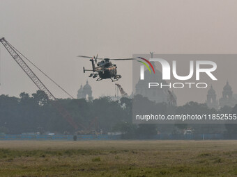 Indian Army helicopters take part in a practice run for the upcoming Vijay Diwas celebrations in Kolkata, India, on December 10, 2024. Vijay...