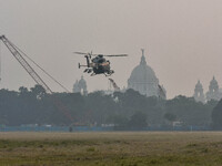 Indian Army helicopters take part in a practice run for the upcoming Vijay Diwas celebrations in Kolkata, India, on December 10, 2024. Vijay...