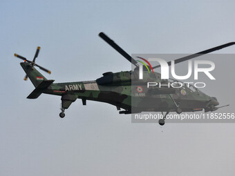 Indian Army helicopters take part in a practice run for the upcoming Vijay Diwas celebrations in Kolkata, India, on December 10, 2024. Vijay...