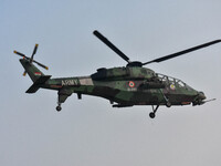 Indian Army helicopters take part in a practice run for the upcoming Vijay Diwas celebrations in Kolkata, India, on December 10, 2024. Vijay...