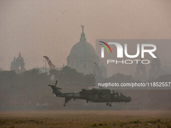 Indian Army helicopters take part in a practice run for the upcoming Vijay Diwas celebrations in Kolkata, India, on December 10, 2024. Vijay...