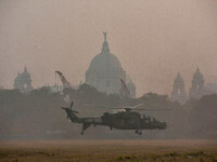 Indian Army helicopters take part in a practice run for the upcoming Vijay Diwas celebrations in Kolkata, India, on December 10, 2024. Vijay...