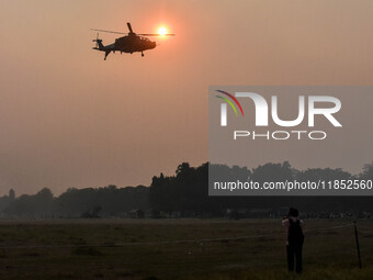 Indian Army helicopters take part in a practice run for the upcoming Vijay Diwas celebrations in Kolkata, India, on December 10, 2024. Vijay...