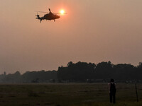 Indian Army helicopters take part in a practice run for the upcoming Vijay Diwas celebrations in Kolkata, India, on December 10, 2024. Vijay...