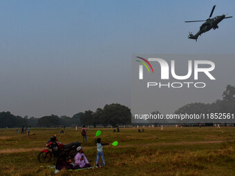 Indian Army helicopters take part in a practice run for the upcoming Vijay Diwas celebrations in Kolkata, India, on December 10, 2024. Vijay...