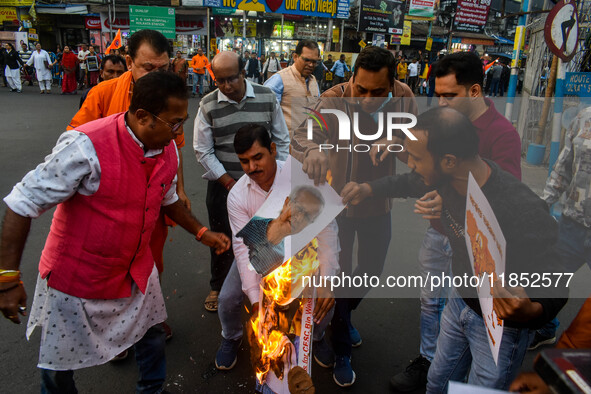 Pro-Hindu activists stage a protest in Kolkata, India, on December 10, 2024, against the attack on minorities in Bangladesh. They burn a pic...