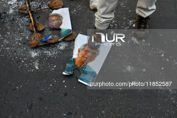 Pro-Hindu activists stage a protest in Kolkata, India, on December 10, 2024, against the attack on minorities in Bangladesh. They burn a pic...