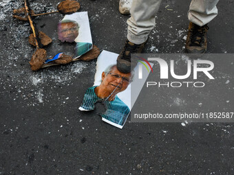 Pro-Hindu activists stage a protest in Kolkata, India, on December 10, 2024, against the attack on minorities in Bangladesh. They burn a pic...