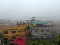 Residential buildings are seen during a cold and foggy day in Siliguri, India, on December 10, 2024. (