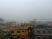 Residential buildings are seen during a cold and foggy day in Siliguri, India, on December 10, 2024. (