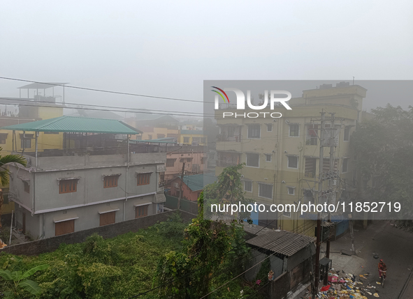 Residential buildings are seen during a cold and foggy day in Siliguri, India, on December 10, 2024. 