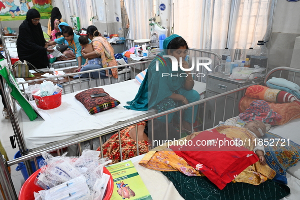 Children receive medical treatment for pneumonia at Dhaka Children's Hospital during the winter season in Dhaka, Bangladesh, on December 10,...