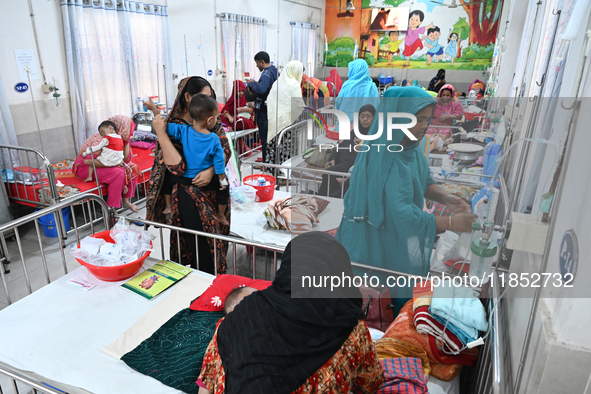 Children receive medical treatment for pneumonia at Dhaka Children's Hospital during the winter season in Dhaka, Bangladesh, on December 10,...