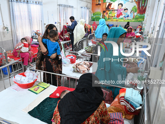 Children receive medical treatment for pneumonia at Dhaka Children's Hospital during the winter season in Dhaka, Bangladesh, on December 10,...