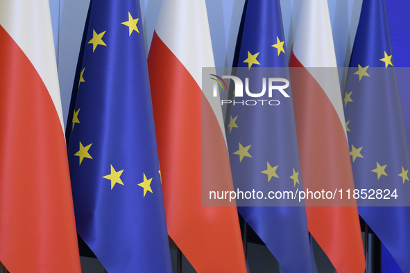 Poland's and European Union flags are pictured before Minister for European Affairs Adam Szlapka's presentation of the program for the 2025...