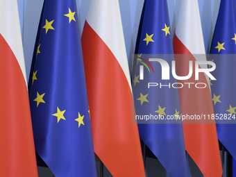 Poland's and European Union flags are pictured before Minister for European Affairs Adam Szlapka's presentation of the program for the 2025...