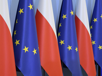 Poland's and European Union flags are pictured before Minister for European Affairs Adam Szlapka's presentation of the program for the 2025...