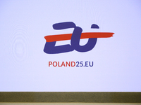 The Polish EU presidency logo appears on a screen during Minister for European Affairs Adam Szlapka's presentation of the program for Poland...