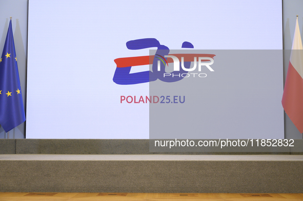 The Polish EU presidency logo appears on a screen during Minister for European Affairs Adam Szlapka's presentation of the program for Poland...