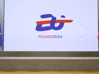 The Polish EU presidency logo appears on a screen during Minister for European Affairs Adam Szlapka's presentation of the program for Poland...