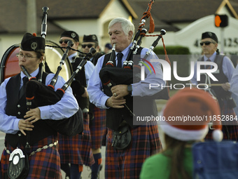 At the 7th Annual Twilight Parade in Hunters Creek, Florida, on Saturday, October 7, children and families take to the streets to watch the...