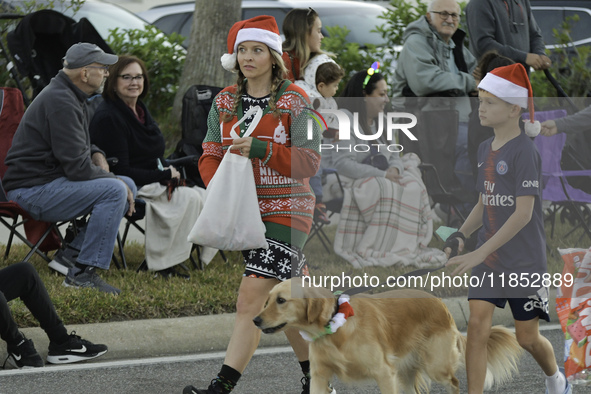 At the 7th Annual Twilight Parade in Hunters Creek, Florida, on Saturday, October 7, children and families take to the streets to watch the...