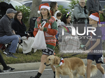 At the 7th Annual Twilight Parade in Hunters Creek, Florida, on Saturday, October 7, children and families take to the streets to watch the...