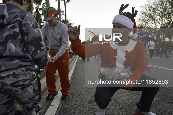 At the 7th Annual Twilight Parade in Hunters Creek, Florida, on Saturday, October 7, children and families take to the streets to watch the...