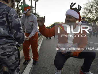 At the 7th Annual Twilight Parade in Hunters Creek, Florida, on Saturday, October 7, children and families take to the streets to watch the...