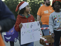 At the 7th Annual Twilight Parade in Hunters Creek, Florida, on Saturday, October 7, children and families take to the streets to watch the...