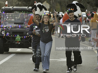 At the 7th Annual Twilight Parade in Hunters Creek, Florida, on Saturday, October 7, children and families take to the streets to watch the...