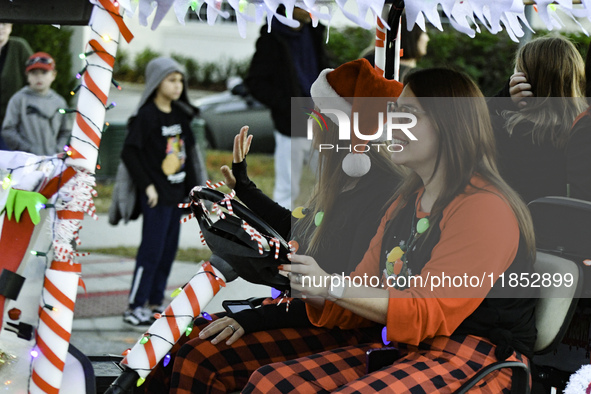 At the 7th Annual Twilight Parade in Hunters Creek, Florida, on Saturday, October 7, children and families take to the streets to watch the...