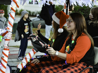 At the 7th Annual Twilight Parade in Hunters Creek, Florida, on Saturday, October 7, children and families take to the streets to watch the...