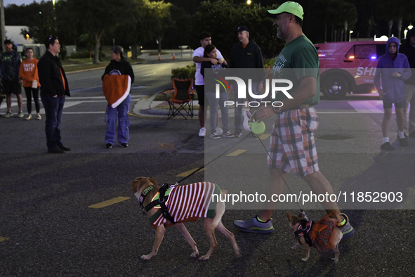 At the 7th Annual Twilight Parade in Hunters Creek, Florida, on Saturday, October 7, children and families take to the streets to watch the...