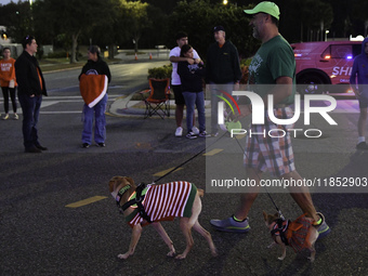 At the 7th Annual Twilight Parade in Hunters Creek, Florida, on Saturday, October 7, children and families take to the streets to watch the...