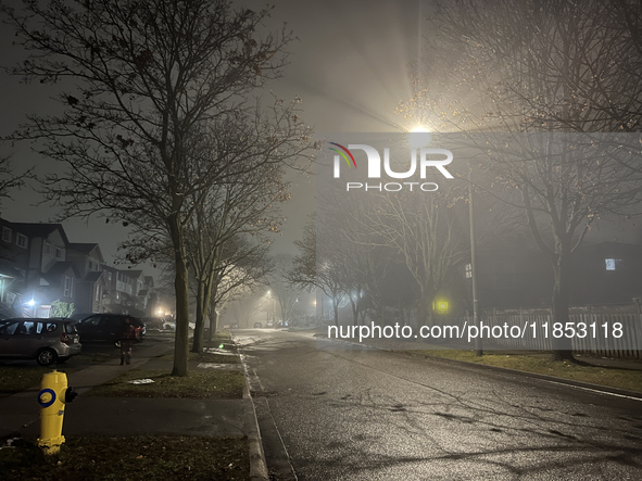 Fog causes near-zero visibility and blankets Toronto, Ontario, Canada, on December 09, 2024. 