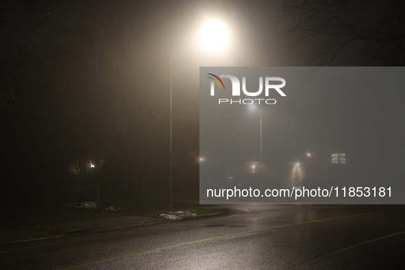 Fog causes near-zero visibility and blankets Toronto, Ontario, Canada, on December 09, 2024. 