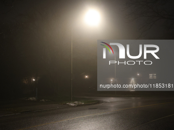 Fog causes near-zero visibility and blankets Toronto, Ontario, Canada, on December 09, 2024. (