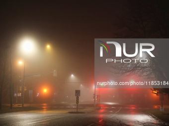 Fog causes near-zero visibility and blankets Toronto, Ontario, Canada, on December 09, 2024. (