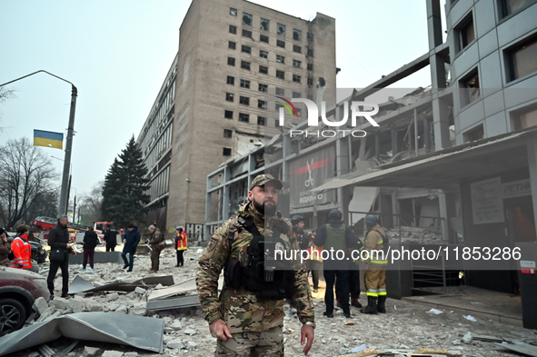 A search and rescue operation takes place after a Russian missile strike in Zaporizhzhia, Ukraine, on December 10, 2024. Three people are de...