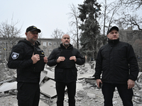 Police officers are near the scene of a Russian missile strike in Zaporizhzhia, Ukraine, on December 10, 2024. Three people are dead and at...