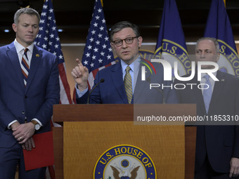 US House Speaker Mike Johnson, alongside GOP members, speaks about immigration policy, China, and other topics during a weekly press confere...