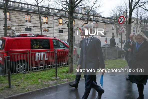 President of the Droite Republicaine parliamentary group, Laurent Wauquiez, arrives to speak with journalists as he leaves the Elysee Palace...