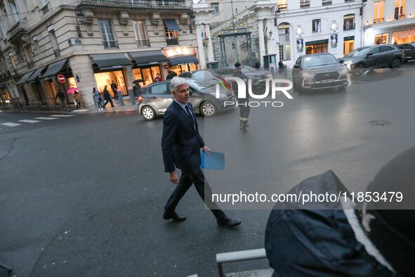 President of the Droite Republicaine parliamentary group, Laurent Wauquiez, arrives to speak with journalists as he leaves the Elysee Palace...