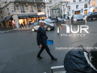 President of the Droite Republicaine parliamentary group, Laurent Wauquiez, arrives to speak with journalists as he leaves the Elysee Palace...