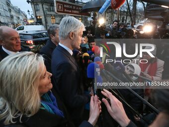 President of the Droite Republicaine parliamentary group, Laurent Wauquiez, speaks to journalists after his meeting with the French presiden...