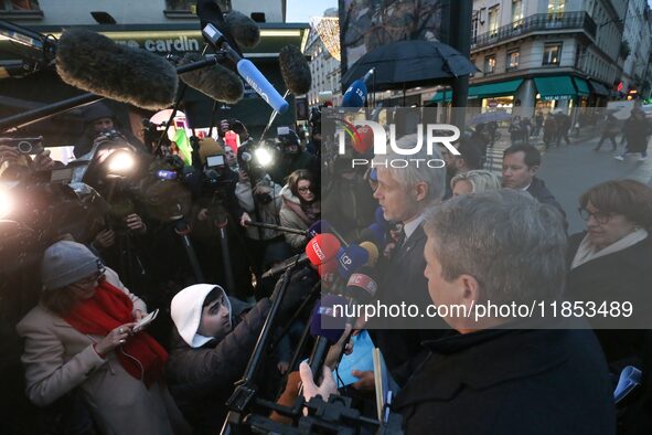 President of the Droite Republicaine parliamentary group, Laurent Wauquiez, speaks to journalists after his meeting with the French presiden...